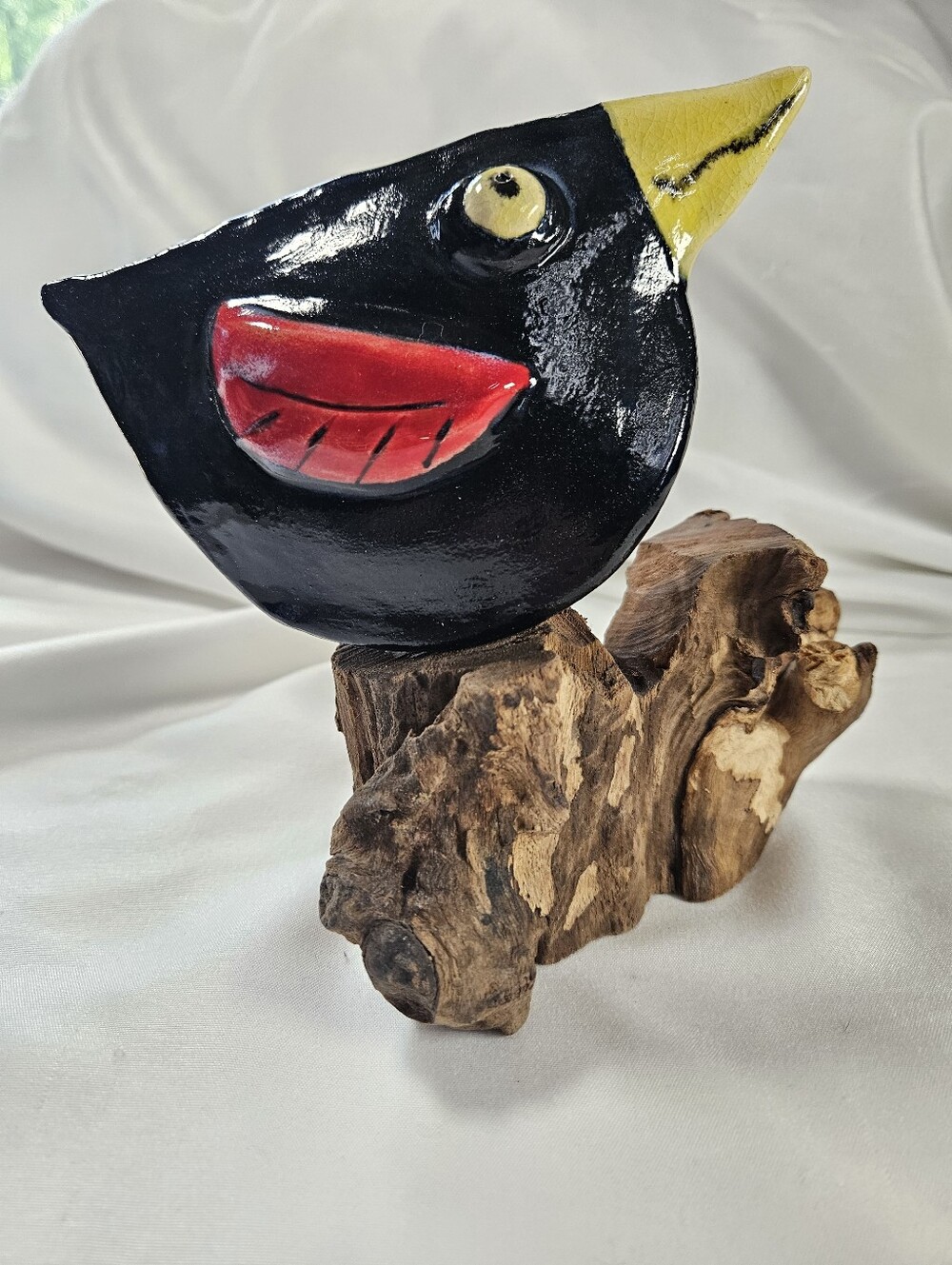 Red winged blackbird ceramic sculpture on wood base. original art.